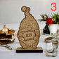 Handgemaakte gepersonaliseerde kerstkabouter in hout, met lasergravure van naam, perfect als unieke kerstdecoratie of cadeau.